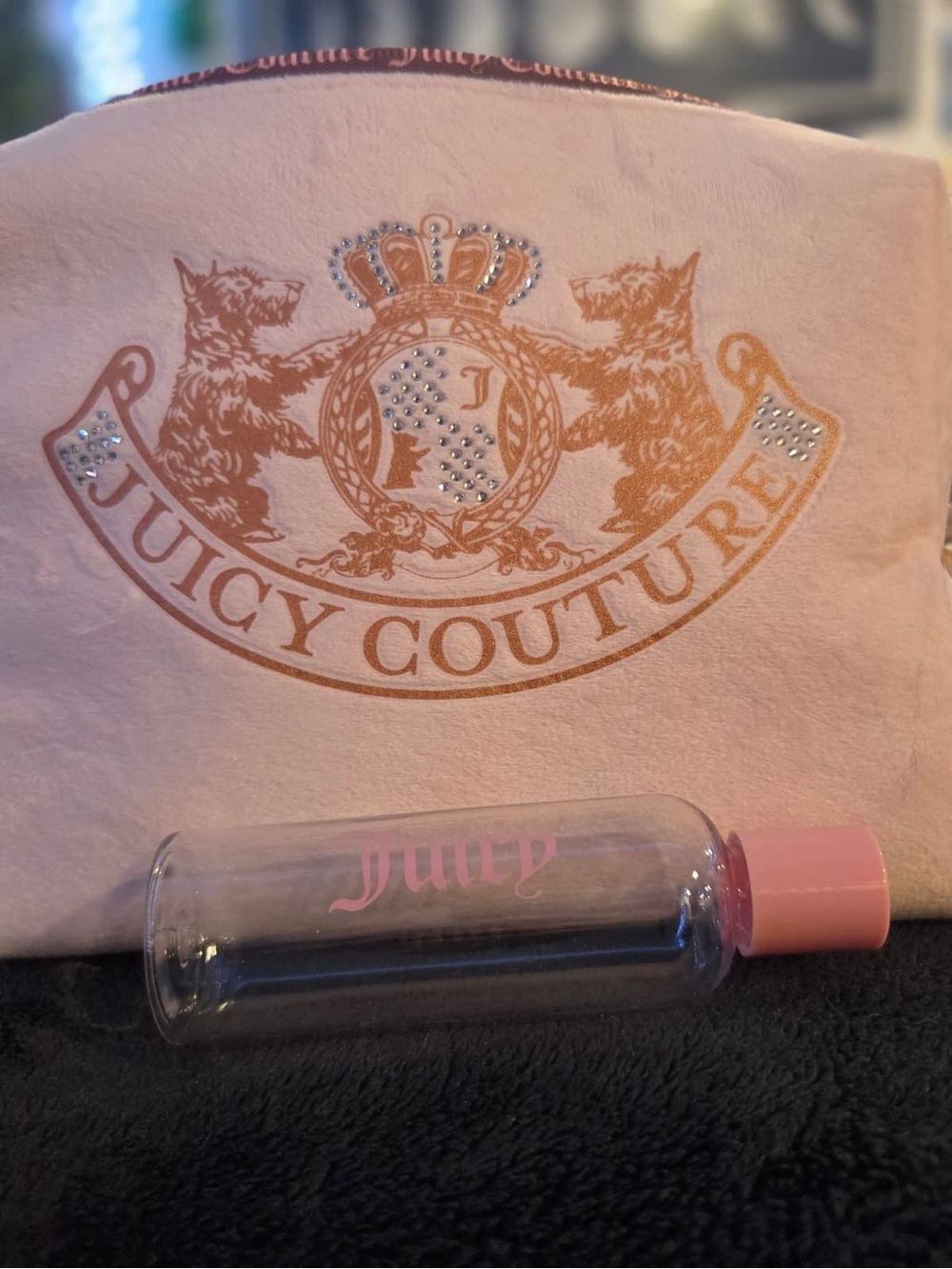 Juicy Couture Light Pink Cosmetic Pouch with TSA approved travel bottle